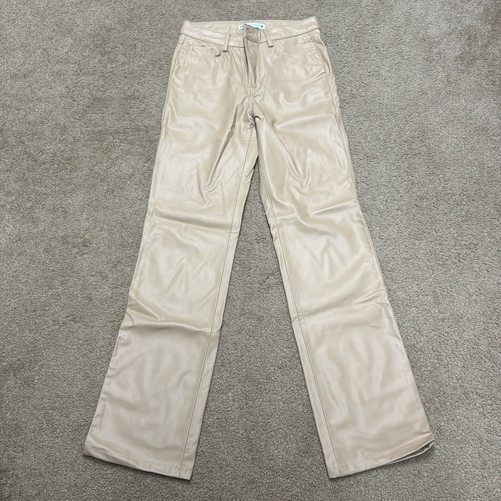 Zara women long faux leather bootcut pants. Size 4